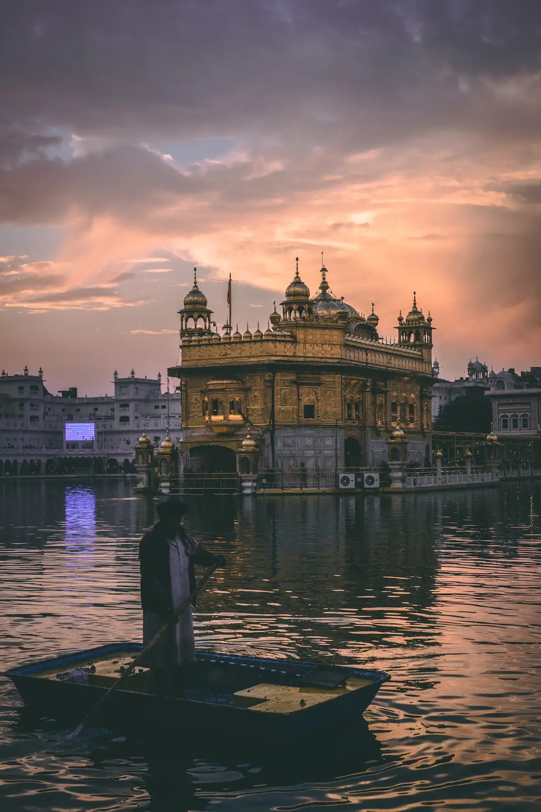 The Golden Temple, Amritsar, glowing at dusk over the holy sarovar